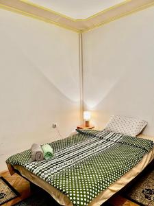 מיטה או מיטות בחדר ב-Apartman 23