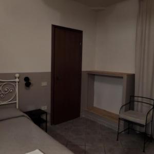 Posteľ alebo postele v izbe v ubytovaní Villa Oasi