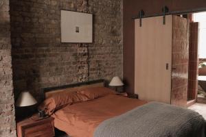 Ліжко або ліжка в номері Mid-Century Studio