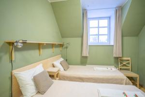 Postel nebo postele na pokoji v ubytování Kongo Hotel