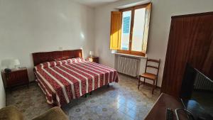 Postel nebo postele na pokoji v ubytování Verena Dependance Savoia & Campana