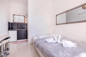 Posteľ alebo postele v izbe v ubytovaní Apartment Entre les jardins