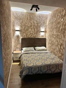 Una cama o camas en una habitación de Apartman Lili Centar
