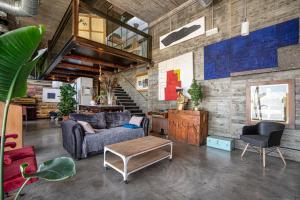 A seating area at THE LOFT - with private pool