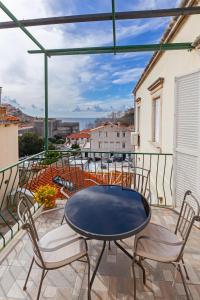 Balkón alebo terasa v ubytovaní Apartment Entre les jardins