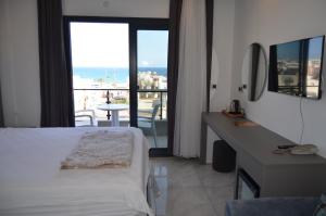 Postel nebo postele na pokoji v ubytování Akdeniz Yaşam Otel