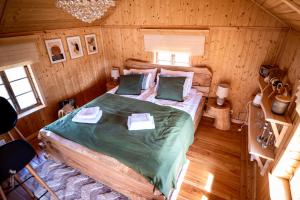 Posteľ alebo postele v izbe v ubytovaní Skansen Bicz Resort