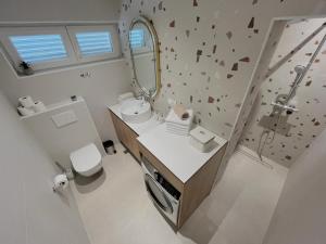 Kylpyhuone majoituspaikassa Premium Suite Anemar