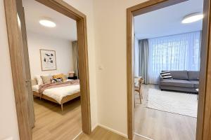 Cama ou camas em um quarto em Modern Apartments In Holesovice
