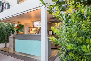 a garden office with a view of the outside of a building at Liddo Boutique hotel in Barletta