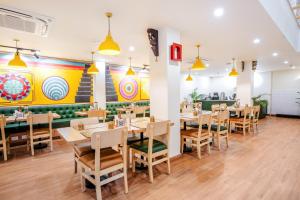 Restaurace v ubytování Bloom Hotel - Medicity Gurugram, Near Medanta Hospital