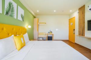 Postel nebo postele na pokoji v ubytování Bloom Hotel - Medicity Gurugram, Near Medanta Hospital