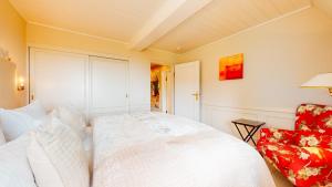 Ein Bett oder Betten in einem Zimmer der Unterkunft Ruarklef