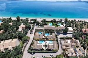 an aerial view of a resort near the beach at Villa Zante in Barbati