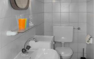 Kúpeľňa v ubytovaní Ferienhaus In Untertilliach