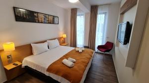 Postel nebo postele na pokoji v ubytování Jafar Resort 2