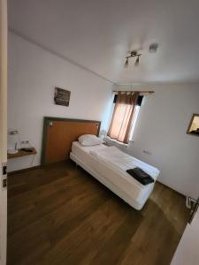 Postel nebo postele na pokoji v ubytování Pension Seevetal