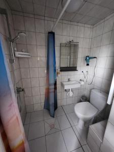 Koupelna v ubytování Pension Seevetal