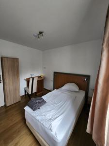 Postel nebo postele na pokoji v ubytování Pension Seevetal