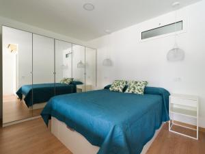 Posteľ alebo postele v izbe v ubytovaní Suites Garden Apartamento 13