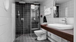 Ένα μπάνιο στο Home Hotel Post