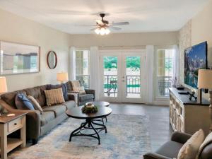 a living room with a couch and a table at ILT 3221 Lakeside Serenity in Lago Vista