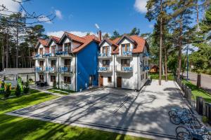 an aerial view of a blue and white house at VivaLaMer in Pobierowo