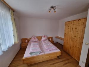 Postel nebo postele na pokoji v ubytování Zettler Apartment