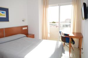Posteľ alebo postele v izbe v ubytovaní Hotel Mirablau