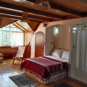 Tempat tidur dalam kamar di Casa de campo en Oaxaca