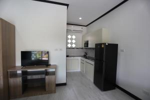 ครัวหรือมุมครัวของ MB House Resort