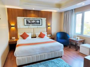 Letto o letti in una camera di Kumari Boutique Hotel
