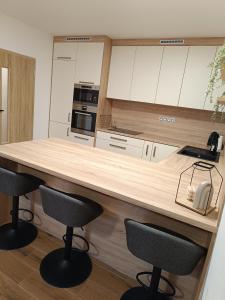 Kuchyň nebo kuchyňský kout v ubytování Apartmán Pregrtovi
