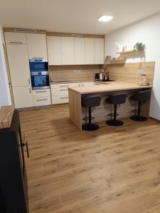 Kuchyň nebo kuchyňský kout v ubytování Apartmán Pregrtovi