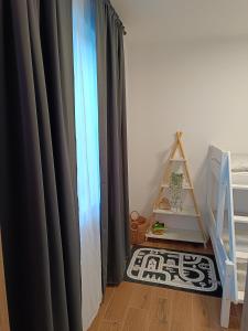 Postel nebo postele na pokoji v ubytování Apartmán Pregrtovi