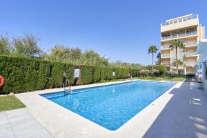 Bazén v ubytování Apartamento en Playa de Motril nebo v jeho okolí