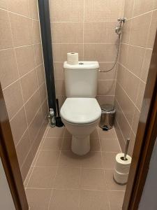 a small bathroom with a toilet in a stall at Řadovka Deštné in Deštné v Orlických horách