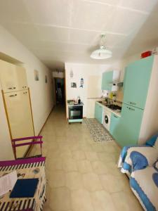 Η κουζίνα ή μικρή κουζίνα στο Stella marina +4 φωτογραφίες