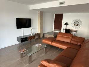 A television and/or entertainment centre at Agi Joan Margarit