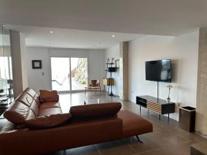 A television and/or entertainment centre at Agi Joan Margarit