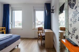 Postel nebo postele na pokoji v ubytování Pension für Monteure in Leipzig