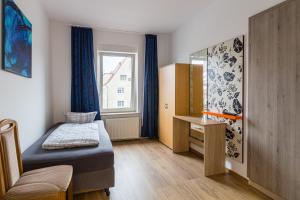 Postel nebo postele na pokoji v ubytování Pension für Monteure in Leipzig