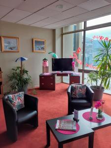 TV/Unterhaltungsangebot in der Unterkunft Hôtel Les Gens De Mer Dunkerque by Popinns