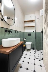 Kúpeľňa v ubytovaní Kopernika City Centre Apartment