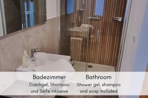 a bathroom with a sink and a shower at Moselidyll im Winzerhaus in Bremm