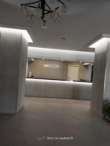 a lobby of a building with a sign on the wall at SERVILUX 4 in Torremolinos