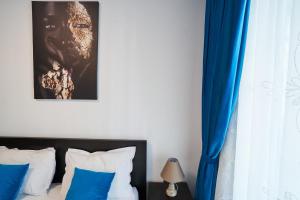 En eller flere senge i et værelse på Bianca Residence 2 by Alz