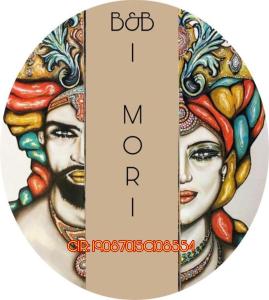 een bord met een foto van twee gezichten bij B&B i MORI in Catania