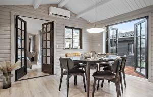 a dining room with a table and chairs at Gorgeous Home In Rude With Wifi in Rude