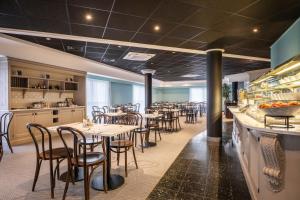 Veitingastaður eða matsölustaður á Thon Hotel Brussels Airport
